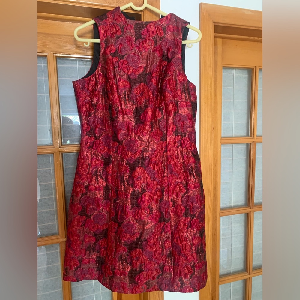 Red dress size 8 new without tags. Shinny